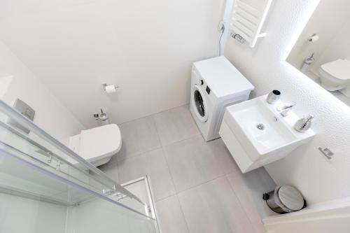 Et badeværelse på Resort Apartamenty Klifowa Rewal 81