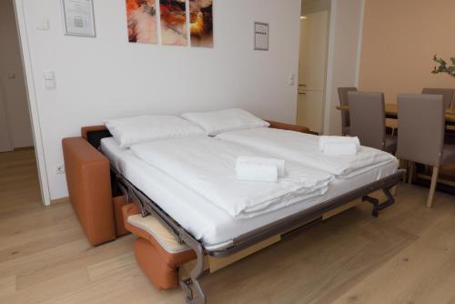 Postel nebo postele na pokoji v ubytování Yourapartment Theresien