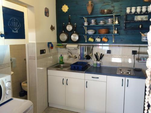 Kuchyň nebo kuchyňský kout v ubytování DVORI CAROLINA