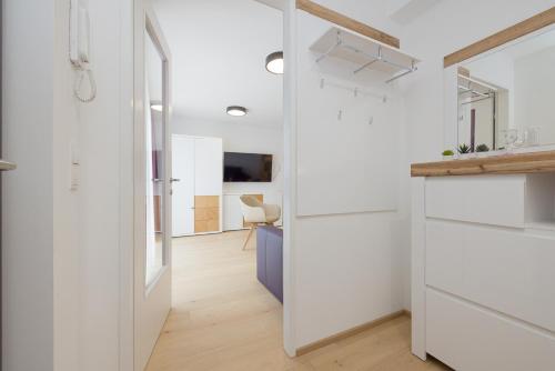 Kuchyň nebo kuchyňský kout v ubytování Yourapartment Theresien