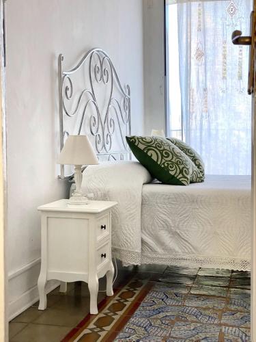Letto o letti in una camera di Casa Chiara