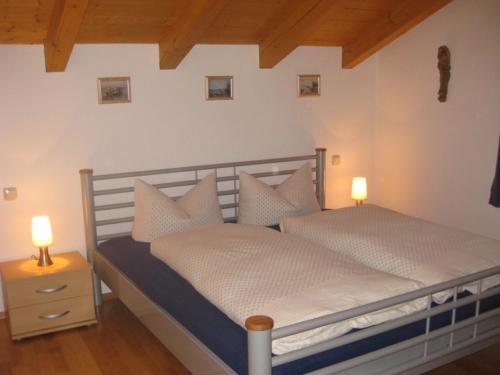 En eller flere senger på et rom på Stöcklhof - Ferienwohnung