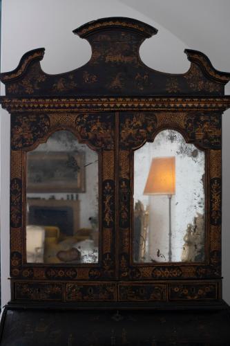 an old mirror with a lamp in a room at Palazzo Don Salvatore in Amalfi
