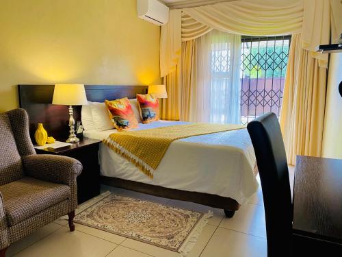 Кровать или кровати в номере Mrhali Boutique Guest House