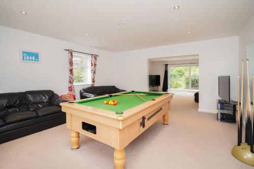 a living room with a pool table in it at Rent My Spa Home with Pool table Hottub and Sauna in Chesterfield