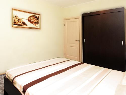 Cama o camas de una habitación en ApartLux Sokolnicheskaya Two Rooms