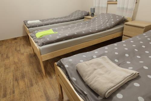 Posteľ alebo postele v izbe v ubytovaní Siedlisko Miluki