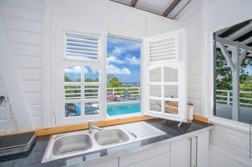 Piscina en o cerca de Magnifique villa avec piscine vue sur mer