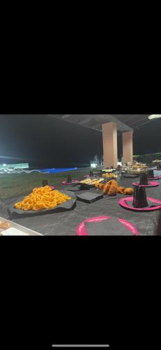 a group of plates of food on the ground at Villa Greco in Rossano