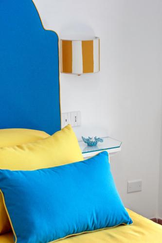 Una cama o camas en una habitación de Estate4home - Medusa Positano