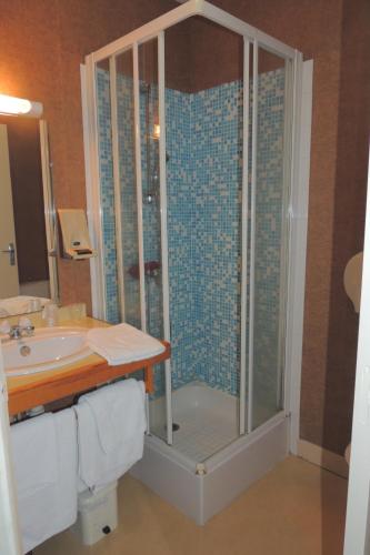 a bathroom with a shower and a sink at Belle Epoque in Chinon
