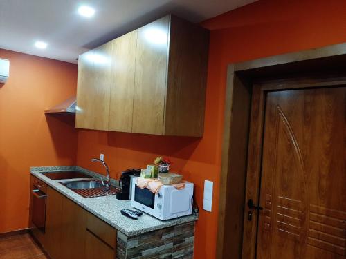 Dapur atau dapur kecil di Estúdio de Amor