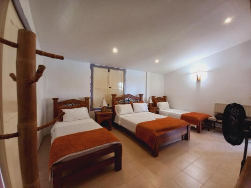 Postel nebo postele na pokoji v ubytování Finca Hotel Villa Del Sol