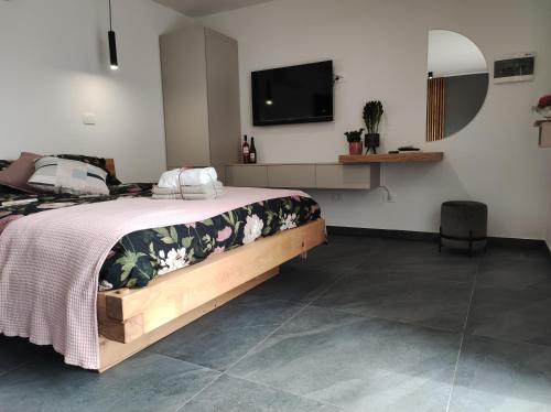 Postel nebo postele na pokoji v ubytování Boutique rooms by Petrič winery