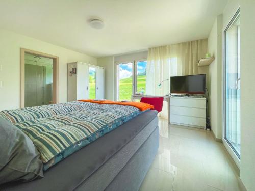 Ένα ή περισσότερα κρεβάτια σε δωμάτιο στο Belair Beinwil - B&B