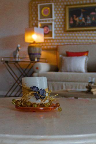 a coffee cup on a plate on a table at Villa Cerrado das Fontainhas SPA in Sintra