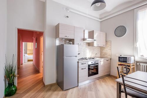 Virtuvė arba virtuvėlė apgyvendinimo įstaigoje Navile Family Apartment by Wonderful Italy