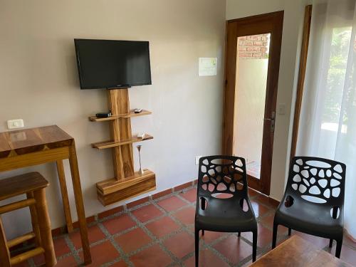 TV a/nebo společenská místnost v ubytování New Nautilus Lodge
