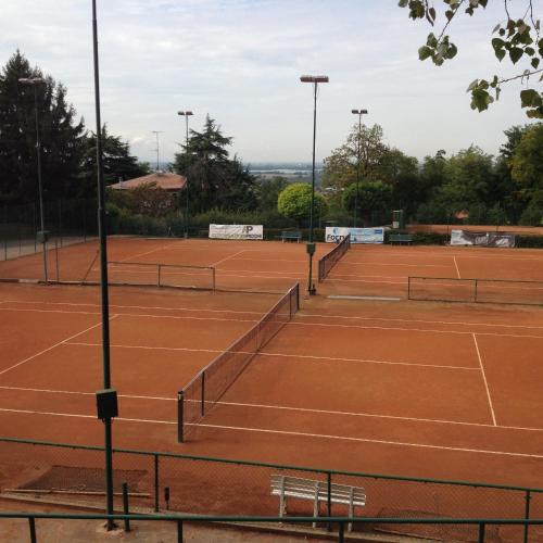 two tennis courts on a tennis court at Casa Cuniolo Guest House in Tortona