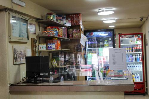 a store with a counter in a store at Hotel Regis in Monterrey