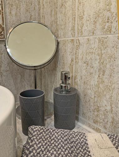 Ванная комната в Akrotiri Rooms