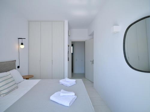 Postel nebo postele na pokoji v ubytování Etherio Apartment II