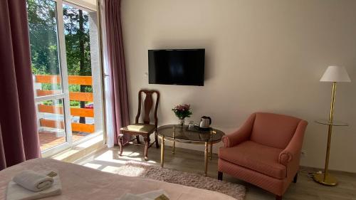 TV a/nebo společenská místnost v ubytování Villa K2