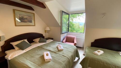 Postel nebo postele na pokoji v ubytování Villa K2