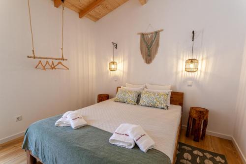 מיטה או מיטות בחדר ב-Varandas de Monsaraz