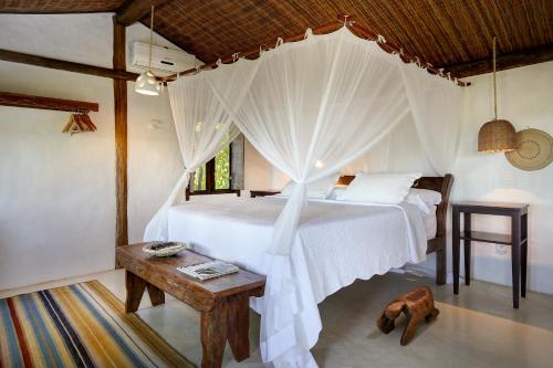 Hotel Calá & Divinoにあるベッド