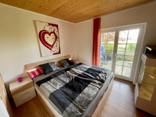 Posteľ alebo postele v izbe v ubytovaní Ferien in Holz - Fühle die Gemütlichkeit Enjoy