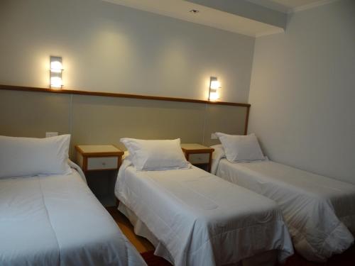Katil atau katil-katil dalam bilik di Hotel Italiano