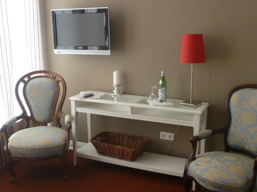 Hotel Waldhof auf Herrenlandにあるテレビまたはエンターテインメントセンター