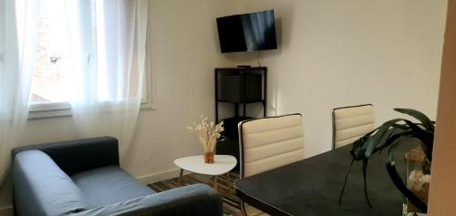 Telewizja i/lub zestaw kina domowego w obiekcie Le Cocon Les Demeures de Thau