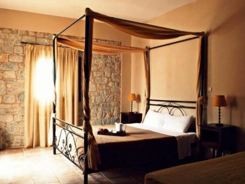 Postel nebo postele na pokoji v ubytování Vlyhada Guesthouse