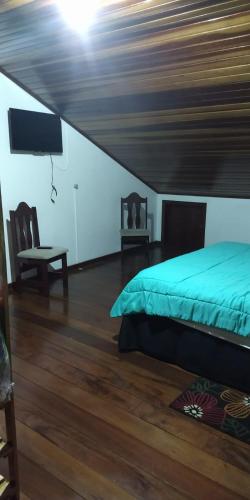 Ένα ή περισσότερα κρεβάτια σε δωμάτιο στο RAJJ APARTAMENTOS