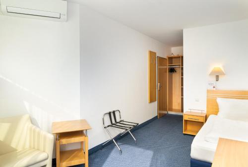 Cama o camas de una habitación en Arthotel ANA Neotel