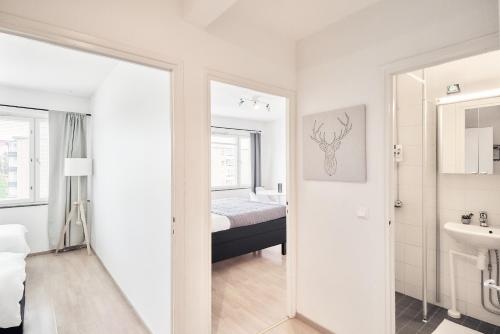 מיטה או מיטות בחדר ב-Norden Homes Turku 2-Bedroom Nordic Apartment