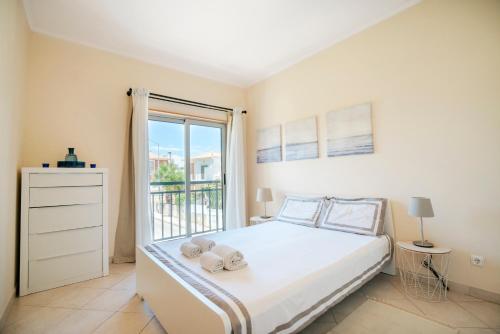 Lova arba lovos apgyvendinimo įstaigoje One Bed Amazing Sunset with Garage , Pool & Lift, Center Algarve