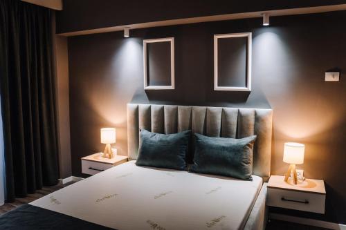 Ένα ή περισσότερα κρεβάτια σε δωμάτιο στο Scandinavian Lux Apartment Oradea