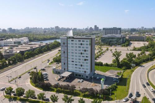 an aerial view of a building in a city at Holiday Inn Gatineau - Ottawa by IHG in Gatineau