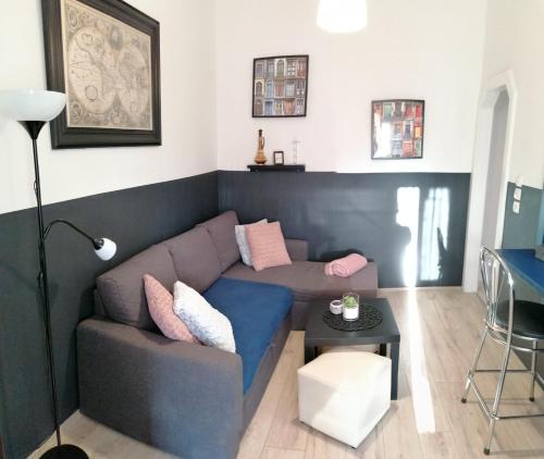a living room with a couch and a table at Apartment Nicol in Pula
