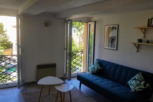 Ruang duduk di Beautiful Apartment 32 M In The Center Of Aix