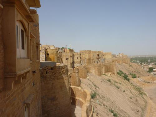 a view of an old city with buildings at Mud Mirror Guesthouse in Jaisalmer