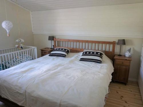 En eller flere senge i et værelse på Holiday home SÖLVESBORG XVI