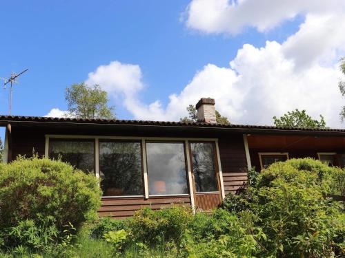 a house with large windows on the side of it at 5 person holiday home in KNÄRED-By Traum in Knäred