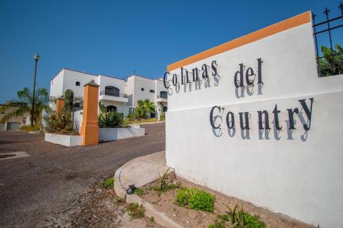 a building with graffiti on the side of it at Colinas C12-2 in San Carlos