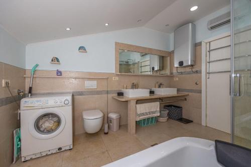Kúpeľňa v ubytovaní Apartments Jarmila