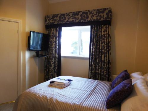 Katil atau katil-katil dalam bilik di Bailey Ground Lodge