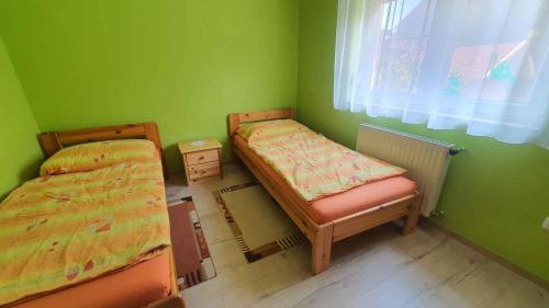 Posteľ alebo postele v izbe v ubytovaní Apartment in Zamardi - Balaton 40474